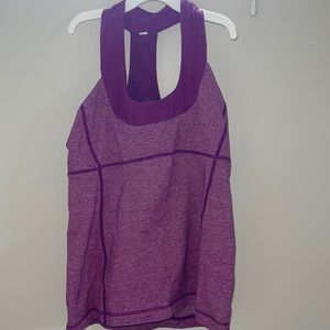 Lululemon built in bra, workout tank top. Purple, size medium can fit large.